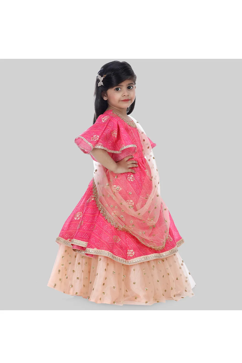 Hot pink bandhani printed layered anarkali with attached dupatta