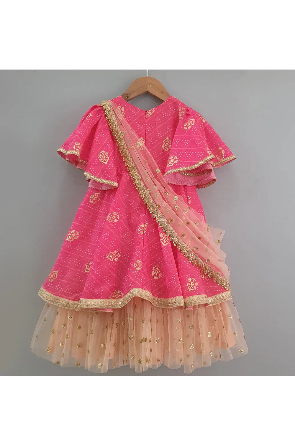 Hot pink bandhani printed layered anarkali with attached dupatta