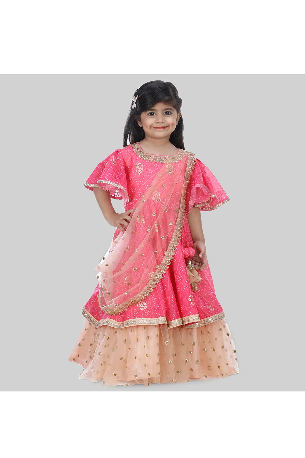 Hot pink bandhani printed layered anarkali with attached dupatta